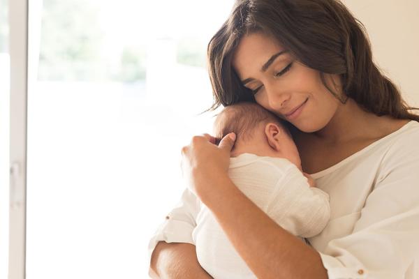 mother holding her baby