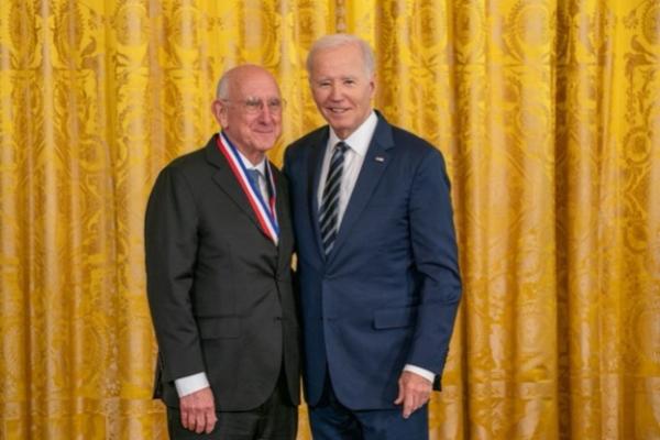 Steven Rosenberg standing next to President Joe Biden