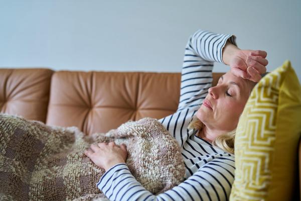 ill woman on couch