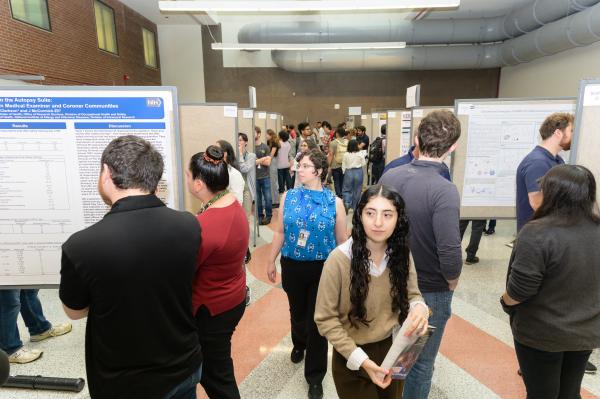 attendees at NIH research festival poster session