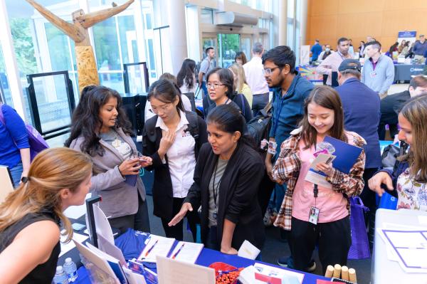 attendees at NIH research festival resource fair