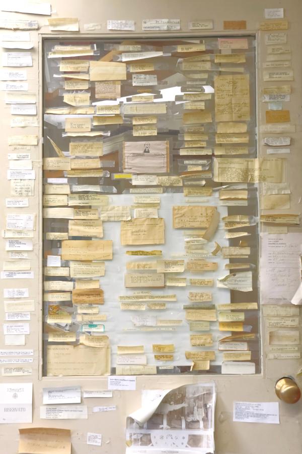 Door with notes taped up on it