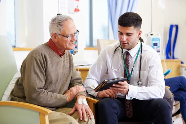 patient talking to their doctor