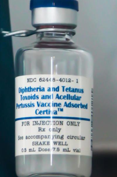 a vial of diphtheria, tetanus, and pertussis (DTP) vaccine