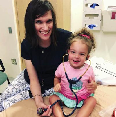 Dr. Alison Boyce with a child patient