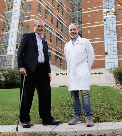 Dr. Kirk Druey (right), the study’s senior author, with Arturo Porzecanski, who has Clarkson disease
