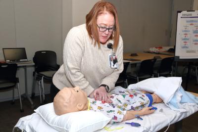 The NIH Medical Simulation Program manikins aid in pediatric CPR training.